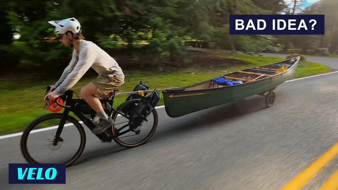 velduro phantom x e gravel bike towing a canoe
